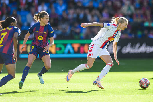 Irene Paredes of Barcelona and Ada Hegerberg of Lyon