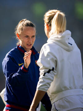 Caroline Graham Hansen of Barcelona and Ada Hegerberg of