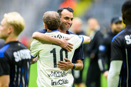 Sirius Melker Heier och tränare Andreas Engelmark jublar
