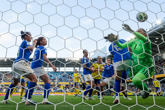 Hanna Lundkvist of Sweden scores 1-2 behind goalkeeper