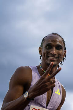 Alison dos Santos of Brazil celebrates