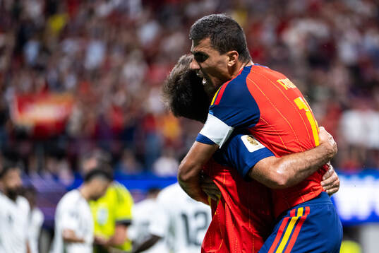 Mikel Oyarzabal of Spain celebrates with Rodri