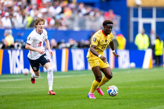 Anthony Gordon of England and Marvin Senaya of Ghana