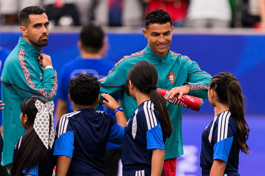 Goalkeeper Diogo Costa and Cristiano Ronaldo of Portugal