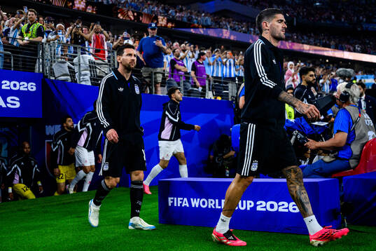 Lionel Messi and Julian Alvarez of Argentina
