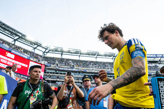 Victor Nilsson Lindelöf of Sweden looks dejected