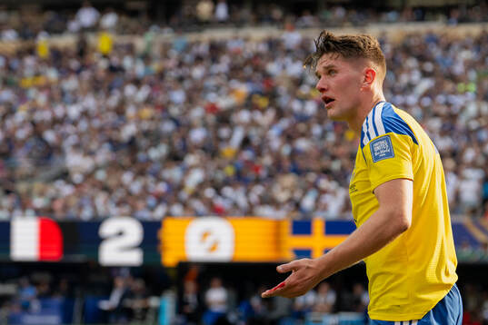 Viktor Gyökeres of Sweden is seen bleeding
