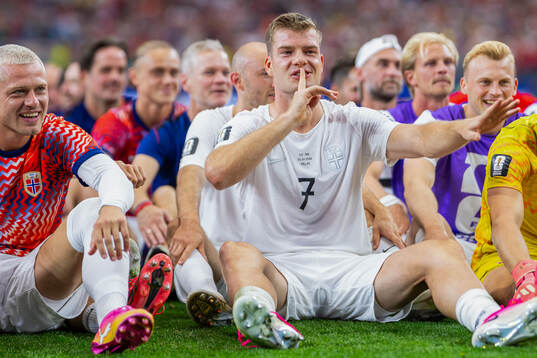 Alexander Sørloth, players and staff of Norway celebrate