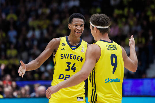 Bobi Klintman and Pelle Larsson of Sweden celebrate