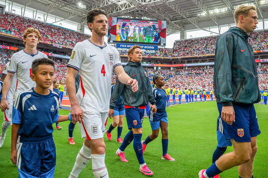 Patrick Berg of Norway enters the pitch