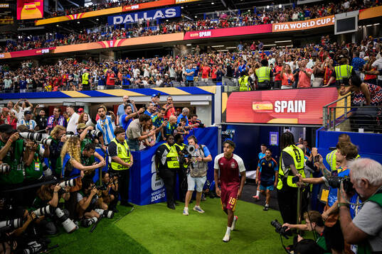 Lamine Yamal of Spain enters the pitch for warm-up
