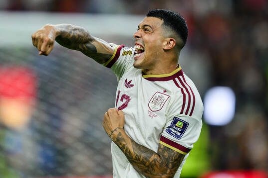 Pedro Porro of Spain celebrates