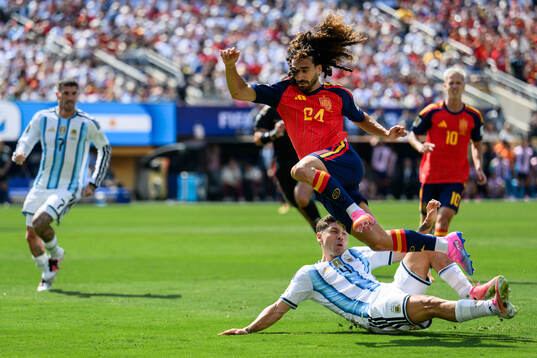 Gonzalo Montiel of Argentina and Marc Cucurella of Spain