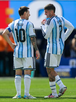 Lionel Messi and Rodrigo De Paul of Argentina