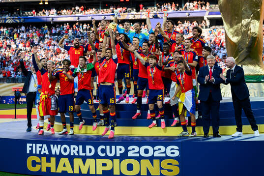 Rodri of Spain hoists the trophy