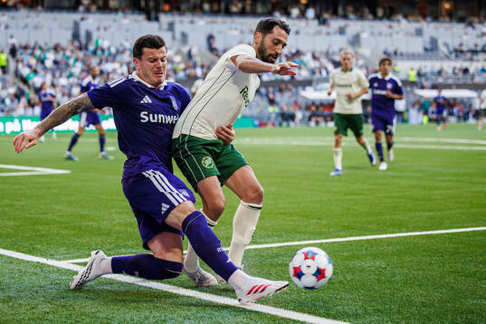 Giulian Biancone of Anderlecht and Nahir Besara of Hammarby
