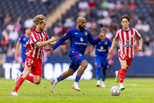 Hjulmand of Atletico de Madrid and Bryan Mbeumo of