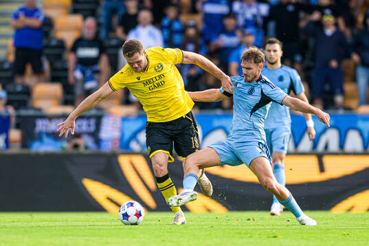 Jacob Bergström of Mjällby and Peter Pokorný of Slovan