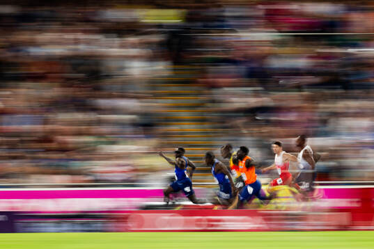 Romell Glave of Great Britain celebrates at finish in