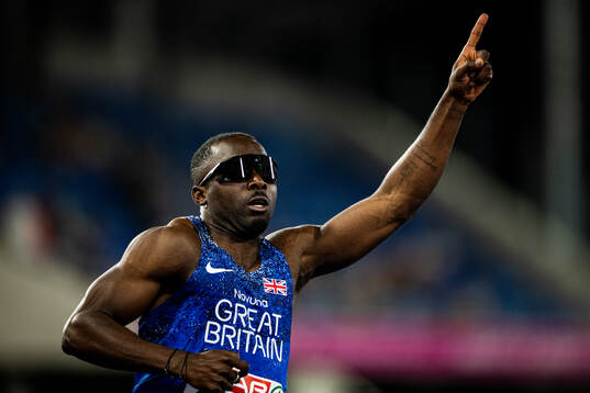 Romell Glave of Great Britain celebrates