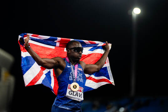 Romell Glave of Great Britain celebrates
