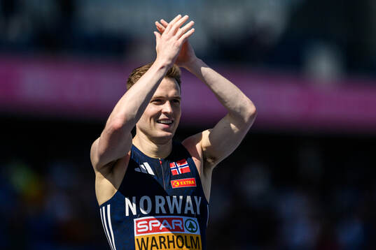 Karsten Warholm of Norway celebrates