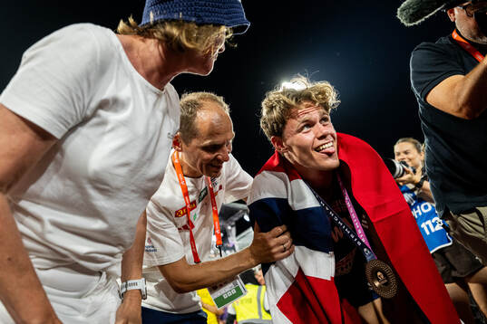 Sander Aae Skotheim of Norway celebrates with family