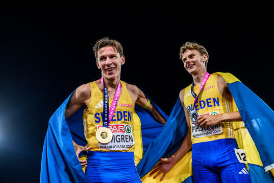 Andreas Almgren of Sweden celebrates first place in men's