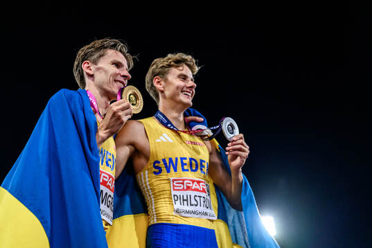 Andreas Almgren of Sweden celebrates first place in men's