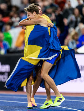 Andreas Almgren of Sweden celebrates first place in men's