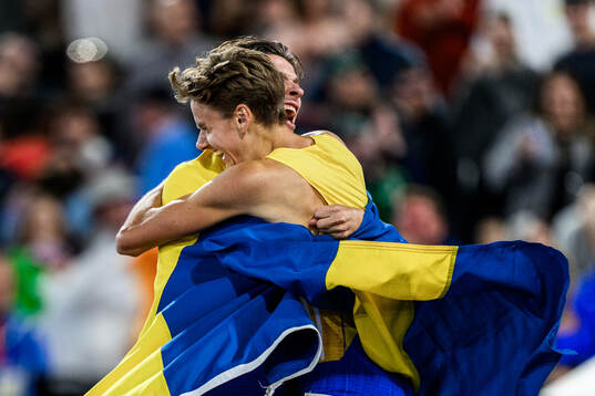Andreas Almgren of Sweden celebrates first place in men's