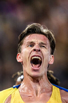 Andreas Almgren of Sweden celebrates first place in men's