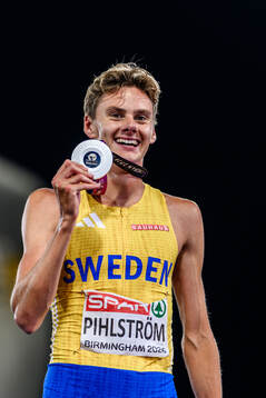 Samuel Pihlström of Sweden celebrates second place in