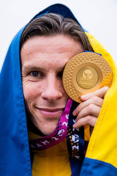 Andreas Almgren of Sweden with his medal