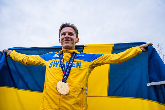 Andreas Almgren of Sweden celebrates with his silver medal