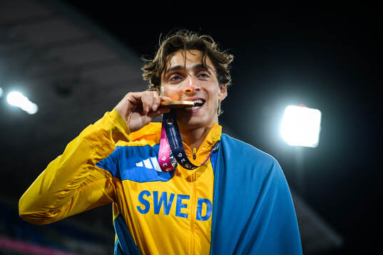 Armand Duplantis of Sweden celebrates with his gold medal