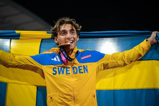 Armand Duplantis of Sweden celebrates with his gold medal