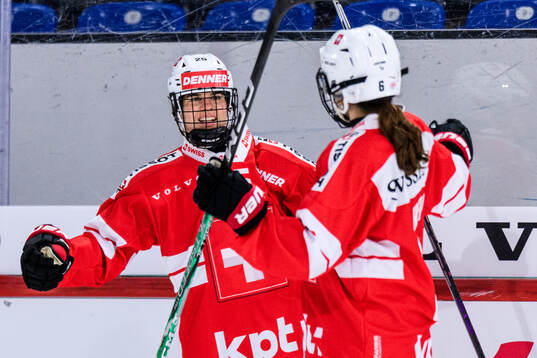 Alina Muller of Switzerland celebrates scoring