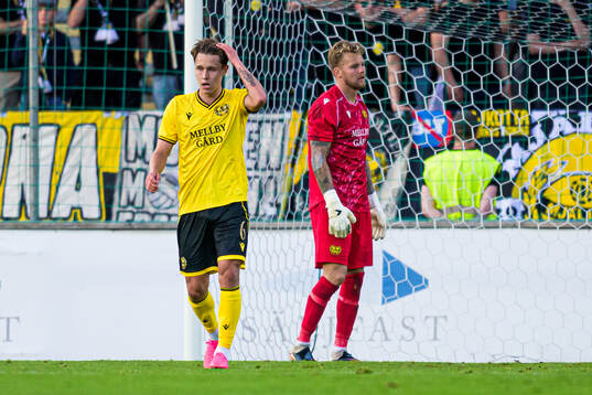 Mads Enggaard and goalkeeper Robin Wallinder of Mjällby