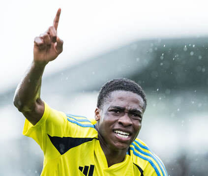Mikel Alex of Sverige celebrates