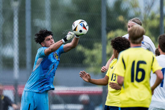 Goalkeeper Elias Blasine of Sverige