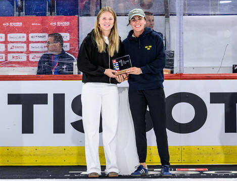 Mira Jungåker and Anna Kjellbin of Sweden is rewarded the