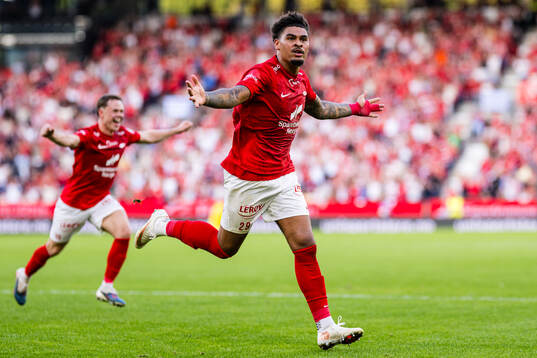 Noah Jean Holm of Brann celebrates
