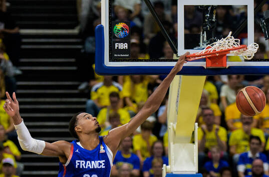 Victor Wembanyama of France dunks the ball